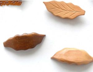 Dřevěný podstavec na jídelní hůlky - tykev tmavě hnědá Made in China